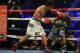 LAS VEGAS, NV - APRIL 12: Manny Pacquiao throws a left hand at Timothy Bradley at the MGM Grand Garden Arena on April 12, 2014 in Las Vegas, Nevada. (Photo by Jeff Gross/Getty Images)