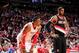 HOUSTON, TX - MARCH 9: Dwight Howard #12 of the Houston Rockets battles for the rebound against LaMarcus Aldridge #12 of the Portland Trail Blazers on March 9, 2014 at the Toyota Center in Houston, Texas. NOTE TO USER: User expressly acknowledges and agr