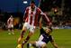 STOKE ON TRENT, ENGLAND - JANUARY 12: Geoff Cameron of Stoke City is tackled by Steven Gerrard of Liverpool during the Barclays Premier League match between Stoke City and Liverpool at Britannia Stadium on January 12, 2014 in Stoke on Trent, England. (P