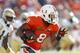 MIAMI GARDENS, FL - OCTOBER 5: Duke Johnson #8 of the Miami Hurricanes runs with the ball against the Georgia Tech Yellow Jackets on October 5, 2013 at Sun Life Stadium in Miami Gardens, Florida.(Photo by Joel Auerbach/Getty Images)