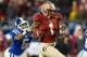 Dec 7, 2013; Charlotte, NC, USA; Florida State Seminoles wide receiver Kelvin Benjamin (1) runs by the tackle of Duke Blue Devils cornerback Ross Cockrell (6) during the third quarter at Bank of America Stadium. FSU defeated Duke 45-7. Mandatory Credit: J