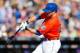 NEW YORK, NY - AUGUST 24: Ike Davis #29 of the New York Mets connects on a second inning base hit against the Detroit Tigers at Citi Field on August 24, 2013 in the Flushing neighborhood of the Queens borough of New York City. (Photo by Jim McIsaac/Gett