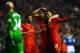 LIVERPOOL, ENGLAND - JANUARY 28: Daniel Sturridge (R) of Liverpool is congratulated by teammates Luis Suarez (C) and Raheem Sterling (L) after scoring his team's third goal as dejected Everton goalkeeper Tim Howard looks on during the Barclays Premier Le