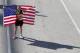 HOUSTON, TX - JANUARY 14: Desiree Davila, who finished with a time of 2:25:55, holds an American flag after the U.S. Marathon Olympic Trials January 14, 2012 in Houston, Texas. (Photo by Thomas B. Shea/Getty Images)
