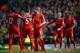 NORWICH, ENGLAND - APRIL 20: Steven Gerrard of Liverpool celebrates victory with Mamadou Sakho of Liverpool at the final whistle during the Barclays Premier League match between Norwich City and Liverpool at Carrow Road on April 20, 2014 in Norwich, Engla
