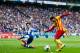 BARCELONA, SPAIN - MARCH 29: Pedro Rodriguez (R) of FC Barcelona plays the ball close to Diego Colotto of RCD Espanyol during the La Liga match between RCD Espanyol and FC Barcelona at Cornella-El Prat Stadium on March 29, 2014 in Barcelona, Spain. (Photo