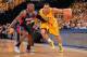 INDIANAPOLIS, IN - APRIL 19: Evan Turner #12 of the Indiana Pacers dribbles to the basket against the Atlanta Hawks in Game One of the Eastern Conference Quarterfinals during the 2014 NBA Playoffs on April 19, 2014 at Bankers Life Fieldhouse in Indianapol