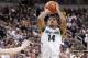 Mar 6, 2014; East Lansing, MI, USA; Michigan State Spartans guard Gary Harris (14) attempts three point basket against the Iowa Hawkeyes during the 2nd half of a game at Jack Breslin Student Events Center. MSU won 86-76. Mandatory Credit: Mike Carter-USA