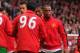 LIVERPOOL, ENGLAND - SEPTEMBER 23: Patrice Evra of Manchester United shakes hands with Luis Suarez of Liverpool before the Barclays Premier League match between Liverpool and Manchester United at Anfield on September 23, 2012 in Liverpool, England. (Pho