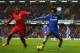 LONDON, ENGLAND - DECEMBER 29: Willian of Chelsea is challenged by Glen Johnson of Liverpool during the Barclays Premier League match between Chelsea and Liverpool at Stamford Bridge on December 29, 2013 in London, England. (Photo by Julian Finney/Getty