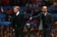 MANCHESTER, ENGLAND - APRIL 01: David Moyes manager of Manchester United and Pep Guardiola head coach of Bayern Muenchen give instructions during the UEFA Champions League Quarter Final first leg match between Manchester United and FC Bayern Muenchen at