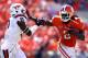 CLEMSON, SC - OCTOBER 20: Sammy Watkins #2 of the Clemson Tigers pushes off Detrick Bonner #8 of the Virginia Tech Hokies during their game at Clemson Memorial Stadium on October 20, 2012 in Clemson, South Carolina. (Photo by Streeter Lecka/Getty Images