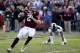 COLLEGE STATION, TX - NOVEMBER 09: Johnny Manziel #2 of the Texas A&M Aggies drops back to pass in the first half during the game against the Mississippi State Bulldogs at Kyle Field on November 9, 2013 in College Station, Texas. (Photo by Scott Hallera