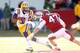 Nov 23, 2012; Fayetteville, AR, USA; LSU Tigers wide receiver Odell Beckham Jr. (3) on a kick return defended by Arkansas Razorbacks kicker Cameron Bryan (47) at Donald W. Reynolds Razorback Stadium. Mandatory Credit: Nelson Chenault-USA TODAY Sports