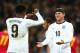 LONDON, ENGLAND - OCTOBER 11: Wayne Rooney of England and Daniel Sturridge of England celebrate after Branko Boskovic of Montenegro (not pictured) scored an own goal to make it 2:0 during the FIFA 2014 World Cup Qualifying Group H match between England a