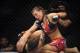 Apr 19, 2014; Orlando, FL, USA; (Editors note: Caption correction) Miesha Tate (red gloves) fights Liz Carmouche (blue gloves) in their women's bantamweight fight during UFC on FOX 11 at Amway Center. Mandatory Credit: David Manning-USA TODAY Sports