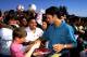 Jul 1993: Ryan Giggs of Manchester United signs autographs for fans before a match against Arsenal in South Africa. Arsenal won the match 2-0. \ Mandatory Credit: David Rogers/Allsport