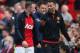 MANCHESTER, ENGLAND - MARCH 29: Wayne Rooney of Manchester United walks off with Ryan Giggs (R) at the end of the Barclays Premier League match between Manchester United and Aston Villa at Old Trafford on March 29, 2014 in Manchester, England. (Photo by