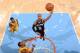 DENVER, CO - MARCH 28: Patty Mills #8 of the San Antonio Spurs takes a shot against the Denver Nuggets on March 28, 2014 at the Pepsi Center in Denver, Colorado. NOTE TO USER: User expressly acknowledges and agrees that, by downloading and/or using this P