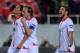 SEVILLE, SPAIN - APRIL 24: Carlos Bacca (L) of Sevilla FC celebrates with Ivan Rakitic and Daniel Carrico after scoring Sevilla's 2nd goal during the UEFA Europa League Semi Final first leg match between Sevilla FC and Valencia CF at Estadio Ramon Sanche