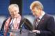 GLASGOW, UNITED KINGDOM - JANUARY 3: Former Rangers player Sandy Jardine (right) and Reverend Stuart D MacQuarrie (left), speak during a memorial service to commemorate the 40th Anniversary Memorial of the Ibrox Disaster held at the Ibrox stadium on Jan