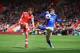 SOUTHAMPTON, ENGLAND - APRIL 26: Adam Lallana of Southampton crosses the ball under pressure from John Stones of Everton during the Barclays Premier League match between Southampton and Everton at St Mary's Stadium on April 26, 2014 in Southampton, Engla