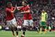 MANCHESTER, ENGLAND - APRIL 26: Juan Mata of Manchester United celebrates scoring the third goal with Tom Cleverley during the Barclays Premier League match between Manchester United and Norwich City at Old Trafford on April 26, 2014 in Manchester, Engla