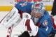 DENVER, CO - MARCH 21: Goaltender Semyon Varlamov #1 of the Colorado Avalanche makes a glove save against the Boston Bruins at the Pepsi Center on March 21, 2014 in Denver, Colorado. (Photo by Michael Martin/NHLI via Getty Images)