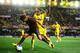 VILLARREAL, SPAIN - APRIL 27: Pedro Rodriguez of FC Barcelona duels for the ball with Javier Aquino of Villarreal CF during the La Liga match between Villarreal CF and FC Barcelona at El Madrigal on April 27, 2014 in Villarreal, Spain. (Photo by David R