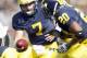 Chad Henne hands off to Mike Hart.