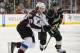Apr 24, 2014; Saint Paul, MN, USA; Colorado Avalanche forward Nathan MacKinnon (29) and Minnesota Wild right Wing Charlie Coyle (3) chase down a loose puck in the second period in game four of the first round of the 2014 Stanley Cup Playoffs at Xcel Energ