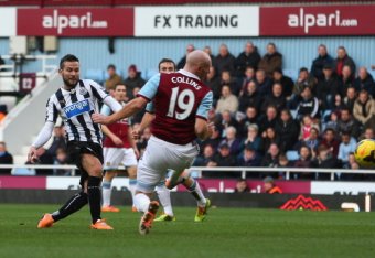 LONDON, ENGLAND - JANUARY 18: Yohan Cabaye of Newcastle United shoots and scores during the Barclays Premier League match between West Ham United and Newcastle United at the Boleyn Ground on January 18, 2014 in London, England. (Photo by Julian Finney/Get