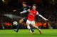 LONDON, ENGLAND - FEBRUARY 19: Laurent Koscielny of Arsenal tackles Claudio Pizarro of Bayern Muenchen during the UEFA Champions League Round of 16 first leg match between Arsenal and FC Bayern Muenchen at Emirates Stadium on February 19, 2014 in London,