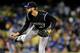 April 26, 2014; Los Angeles, CA, USA; Colorado Rockies relief pitcher Chris Martin (47) pitches the seventh inning against the Los Angeles Dodgers at Dodger Stadium. Mandatory Credit: Gary Vasquez-USA TODAY Sports