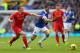 LIVERPOOL, ENGLAND - NOVEMBER 23: Kevin Mirallas of Everton competes with Lucas of Liverpool during the Barclays Premier League match between Everton and Liverpool at Goodison Park on November 23, 2013 in Liverpool, England. (Photo by Alex Livesey/Getty