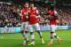 HULL, ENGLAND - APRIL 20: Lukas Podolski (C) of Arsenal celebrates with team mates Olivier Giroud (L) and Bacary Sagna (R) after scoring his sides third goal during the Barclays Premier League match between Hull City and Arsenal at KC Stadium on April 20