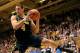 DURHAM, NC - DECEMBER 03: Mitch McGary #4 of the Michigan Wolverines pulls down a rebound against the Duke Blue Devils at Cameron Indoor Stadium on December 3, 2013 in Durham, North Carolina. Duke won 79-69. (Photo by Grant Halverson/Getty Images)