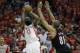 Apr 30, 2014; Houston, TX, USA; Houston Rockets guard James Harden (13) shoots the ball over Portland Trail Blazers forward Nicolas Batum (88) during the second quarter in game five of the first round of the 2014 NBA Playoffs at Toyota Center. Mandatory C
