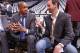 BROOKLYN, NY - APRIL 25: General Manager Masai Ujiri of the Toronto Raptors speaks with Howard Beck of the Bleacher Report before game three of the Eastern Conference Playoffs between the Brooklyn Nets and the Toronto Raptors in Brooklyn, New York. NOTE T