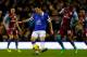LIVERPOOL, ENGLAND - FEBRUARY 01: Gareth Barry (L) of Everton in action with Christian Benteke of Aston Villa during the Barclays Premier League match between Everton and Aston Villa at Goodison Park on February 1, 2014 in Liverpool, England. (Photo by Pa