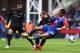 LONDON, ENGLAND - APRIL 27: Marouane Chamakh of Crystal Palace is tackled by Pablo Zabaleta of Manchester City watched by Javi Garcia of Manchester City during the Barclays Premier League match between Crystal Palace and Manchester City at Selhurst Park o