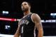 Apr 9, 2014; Orlando, FL, USA; Brooklyn Nets guard Deron Williams (8) looks up against the Orlando Magic during the second half at Amway Center. Orlando Magic defeated the Brooklyn Nets 115-111. Mandatory Credit: Kim Klement-USA TODAY Sports