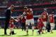 LONDON, ENGLAND - MAY 04: Lukas Podolski of Arsenal jokes with Jack Wilshere and his son Archie during the Barclays Premier League match between Arsenal and West Bromwich Albion at the Emirates Stadium on May 4, 2014 in London, England. (Photo by Shaun