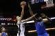 May 4, 2014; San Antonio, TX, USA; San Antonio Spurs guard Manu Ginobili (20) drives to the basket as Dallas Mavericks center DeJuan Blair (45) defends in game seven of the first round of the 2014 NBA Playoffs at AT&T Center. Mandatory Credit: Soobum Im-U