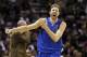 May 4, 2014; San Antonio, TX, USA; Dallas Mavericks forward Dirk Nowitzki (41) reacts against the San Antonio Spurs in game seven of the first round of the 2014 NBA Playoffs at AT&T Center. Mandatory Credit: Soobum Im-USA TODAY Sports