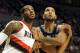 Dec 13, 2012; Portland, OR, USA; Portland Trail Blazers power forward LaMarcus Aldridge (12) and San Antonio Spurs power forward Tim Duncan (21) battle for position under the basket during the fourth quarter of the game at the Rose Garden. The Blazers won