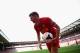 LIVERPOOL, ENGLAND - OCTOBER 05: Steven Gerrard of Liverpool collects the ball to take a corner during the Barclays Premier League match between Liverpool and Crystal Palace at Anfield on October 5, 2013 in Liverpool, England. (Photo by Clive Brunskill/