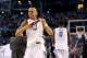 ARLINGTON, TX - APRIL 07: Shabazz Napier #13 of the Connecticut Huskies celebrates on the court after defeating the Kentucky Wildcats 60-54 in the NCAA Men's Final Four Championship at AT&T Stadium on April 7, 2014 in Arlington, Texas. (Photo by Ronald