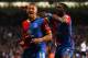 LONDON, ENGLAND - MAY 05: Dwight Gayle #16 (L) of Crystal Palace celebrates with teammate Yannick Bolasie after scoring his team's third goal to level the scores at 3-3 during the Barclays Premier League match between Crystal Palace and Liverpool at Selh