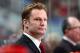 Kirk Muller (foreground) and Dave Lewis (background) look on from behind the bench.
